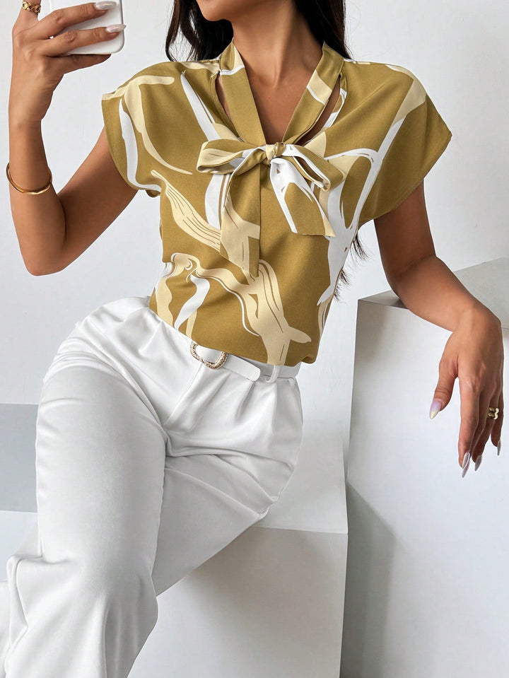 Womens Graphic Tie Neck Batwing Blouse