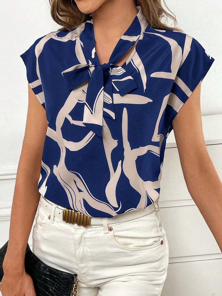 Womens Graphic Tie Neck Batwing Blouse